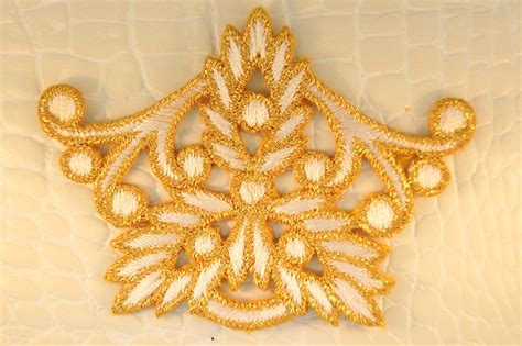 metallic fabric applique|resin appliques and onlays.